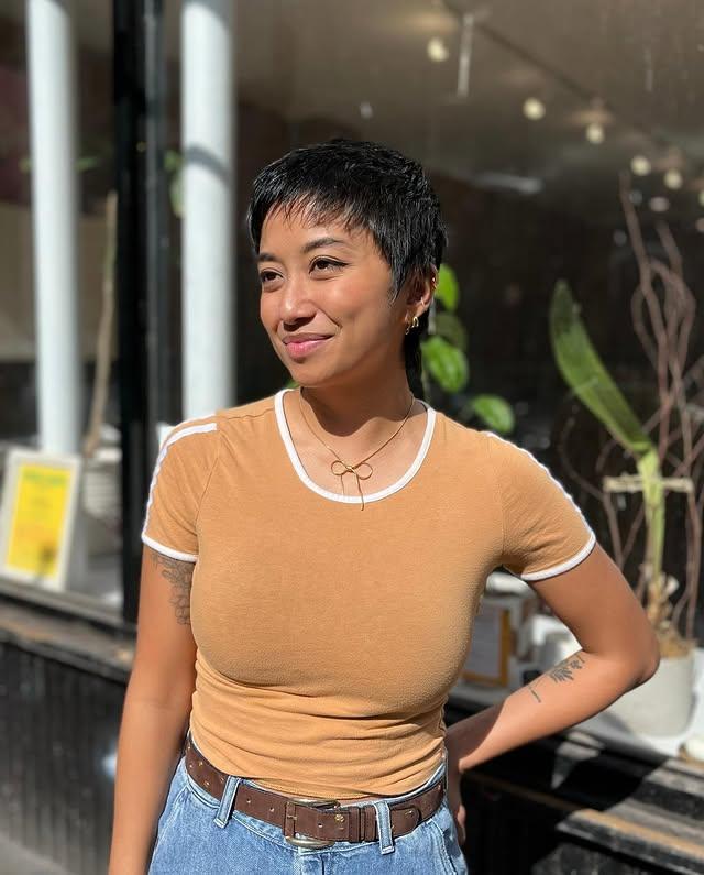 A textured pixie cut with choppy layers for an edgy and modern look.