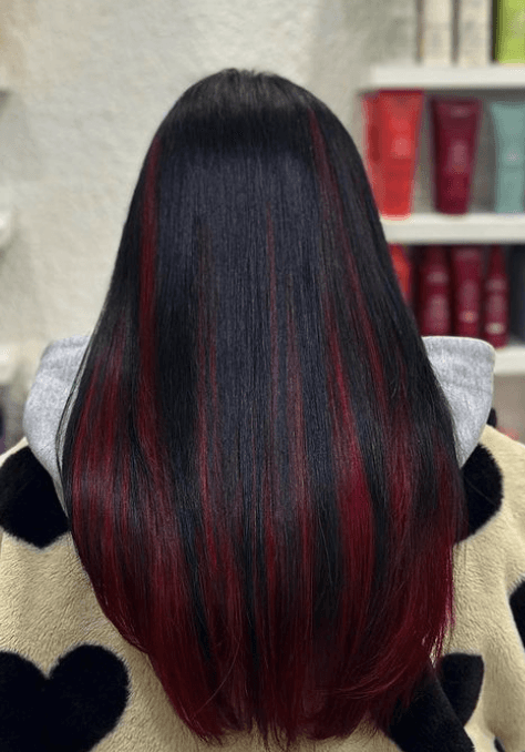 Long, sleek, and straight black hair with vivid red highlights and a smooth finish. 1