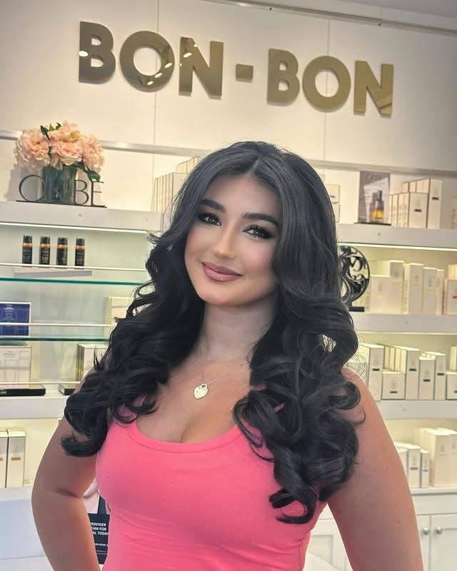 Long, voluminous Hollywood glam waves with a side part, perfect for a bridal red carpet feel.