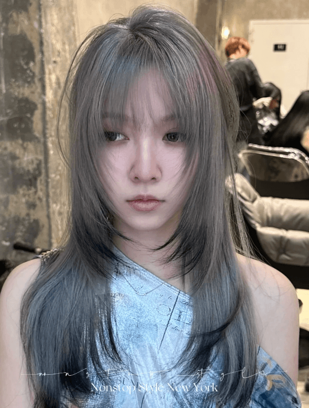 A long, straight hairstyle with a stunning ash gray and silver color palette, featuring intricate layers, a soft fringe, and delicate, face-framing layers.
(NonstopStyle: by Hiro) 2