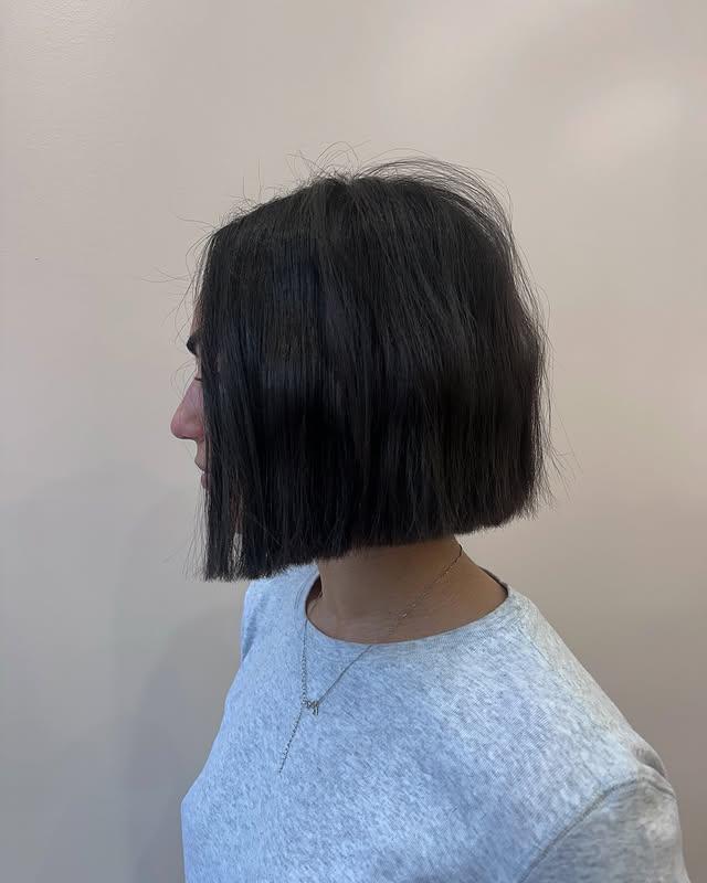 A sleek, chin-length bob with a blunt finish, offering a modern and edgy short hairstyle.