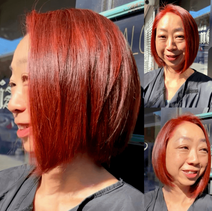A classic inverted bob with a modern twist, featuring a slightly angled cut and rich copper-red color.