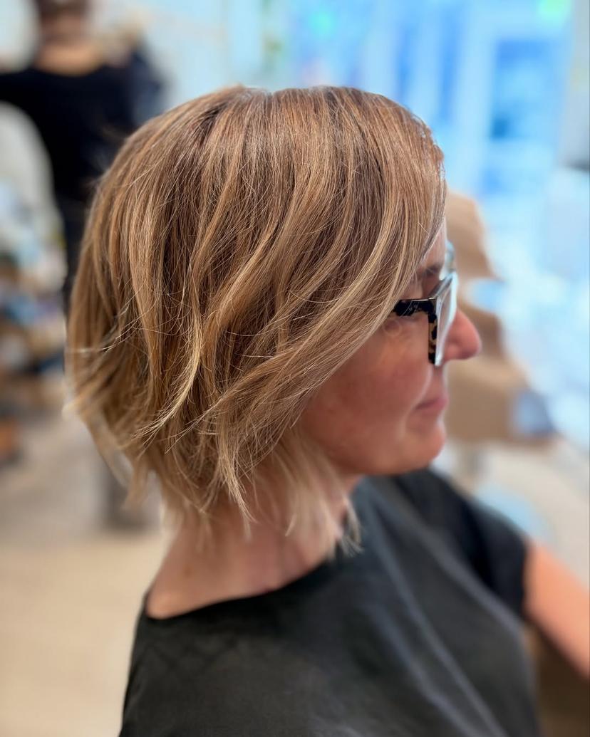 Textured layered bob with highlights, showcasing subtle dimension in Manhattan, New York