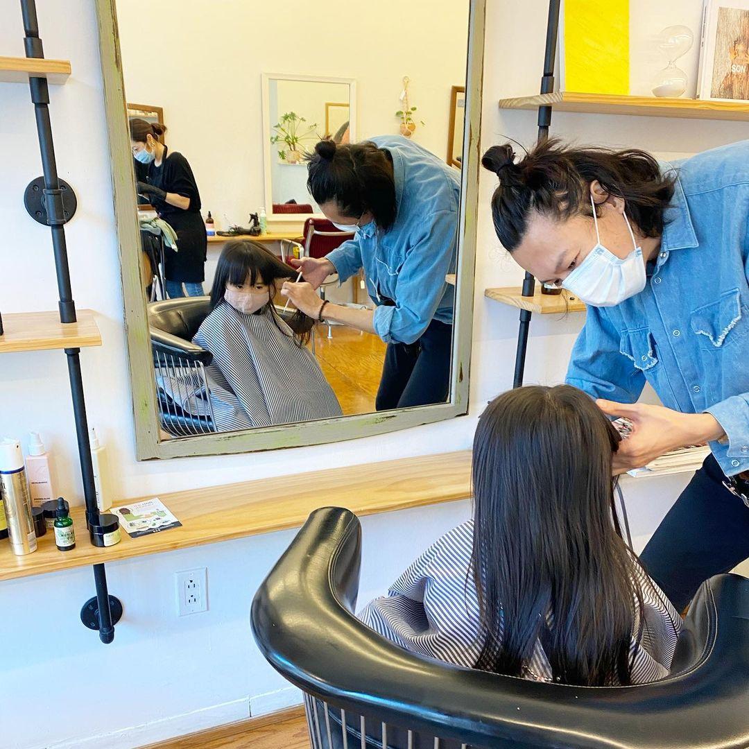Whimsical and fairy tale-like crown braid with blunt bangs and loose strands. by @takeohair 3