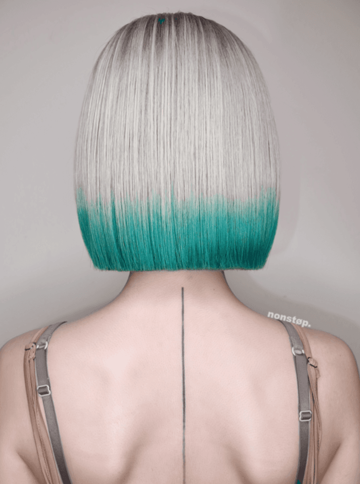 A sleek, straight bob cut with a striking silver base that transitions into vibrant teal tips, creating an ombre gradient effect.
(NonstopStyle: by Hiro) 1