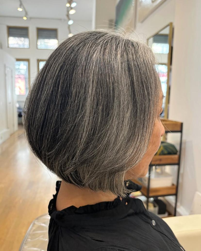 Chic stacked bob with textured layers for added volume and shape, ideal for a fuller appearance.