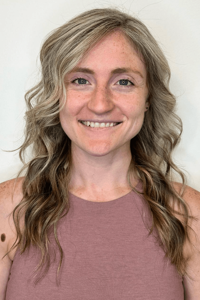 Long, wavy hair with a soft blonde base and honey highlights. The style features subtle waves, a side part, and a layered cut for added volume and movement.

Color by @simabeautynyc
 3