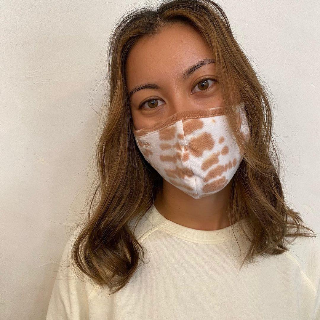 Medium length wavy brown hair with subtle honey highlights