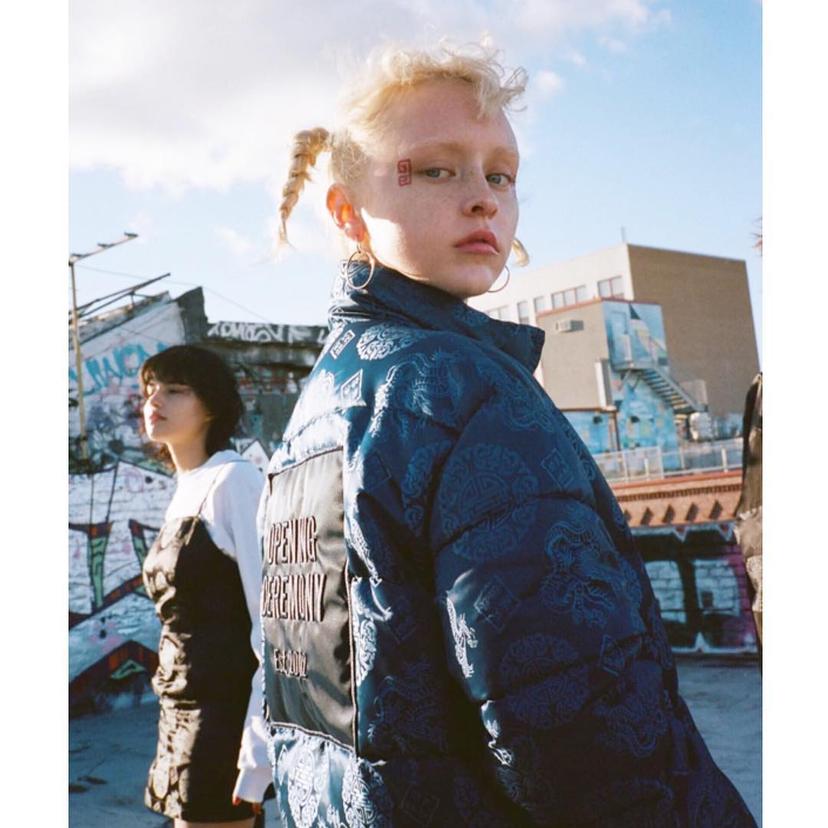 Short blonde hair styled into two loose braids, showcasing a trendy and edgy urban style.