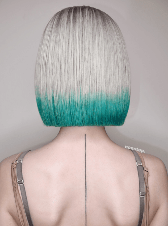 A sleek, straight bob cut with a striking silver base that transitions into vibrant teal tips, creating an ombre gradient effect.
(NonstopStyle: by Hiro) 1