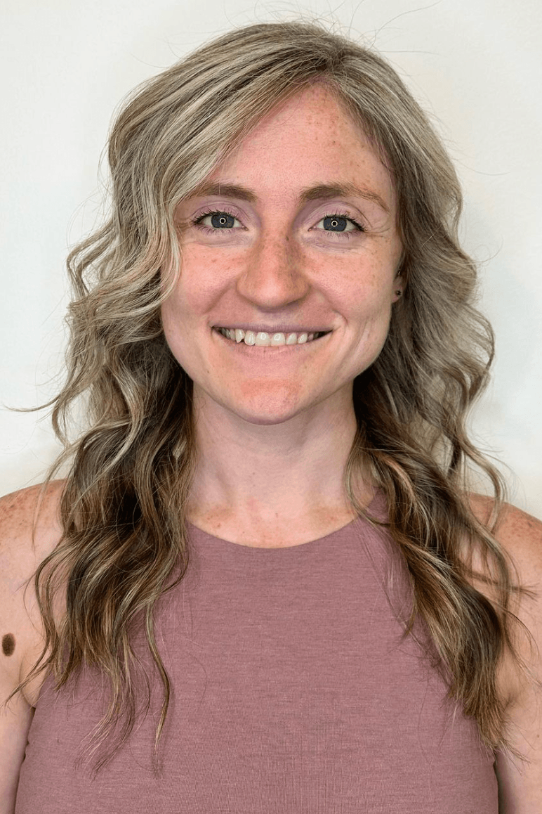 Long, wavy hair with a soft blonde base and honey highlights. The style features subtle waves, a side part, and a layered cut for added volume and movement.

Color by @simabeautynyc
 3